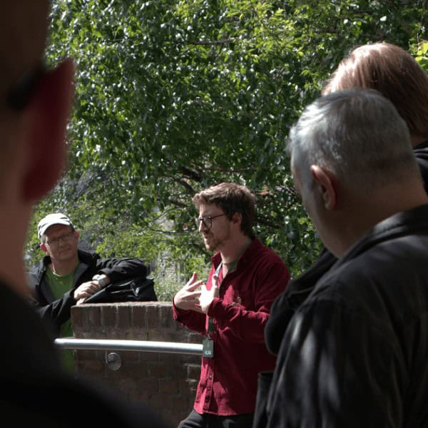 Dublin Mythology and Folklore tour guide with a group of tourists on a walking tour.